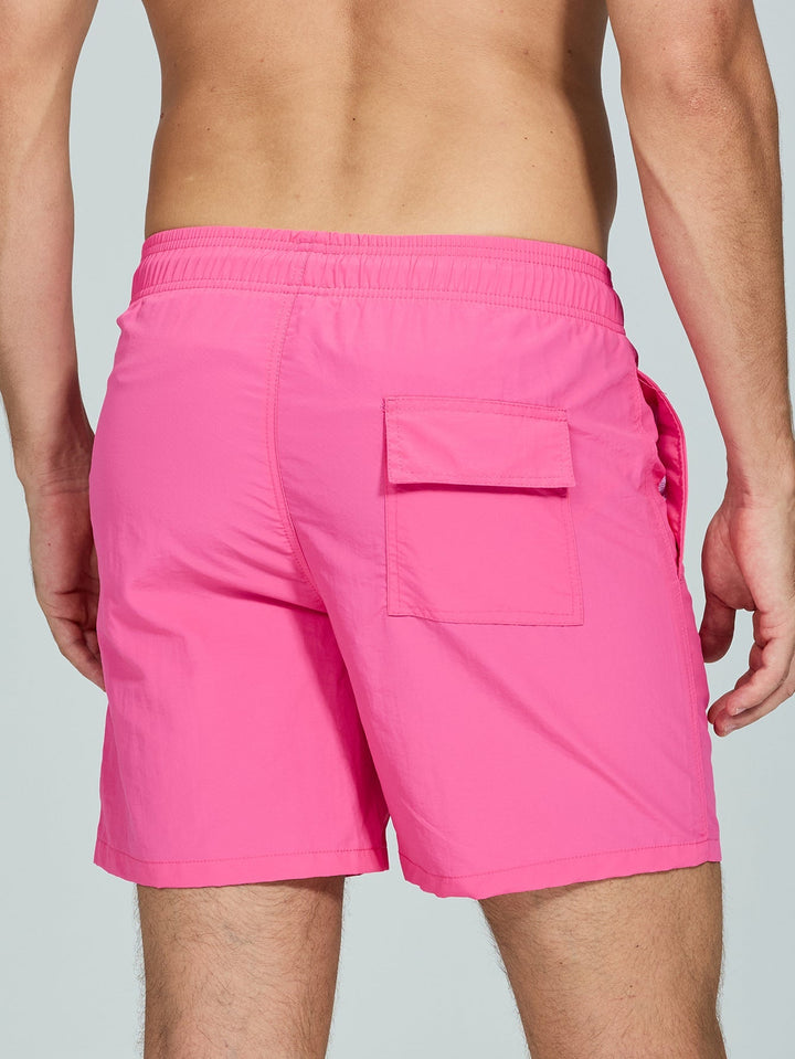 Comfortable men's vibrant hot pink leopard print shirt & swim shorts set, ideal for casual summer outings.