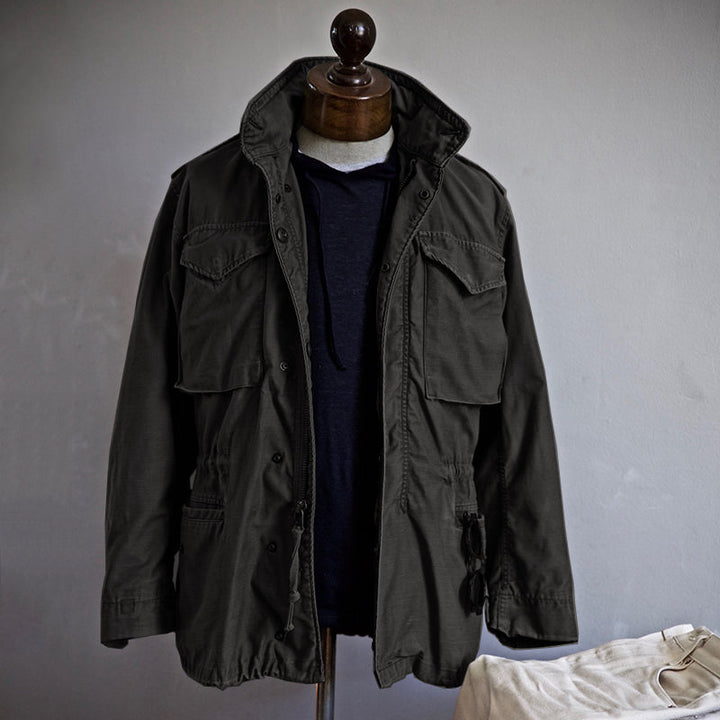 Men's fashion vintage military jacket. Rugged utility outerwear with hidden hood & ample cargo pockets.