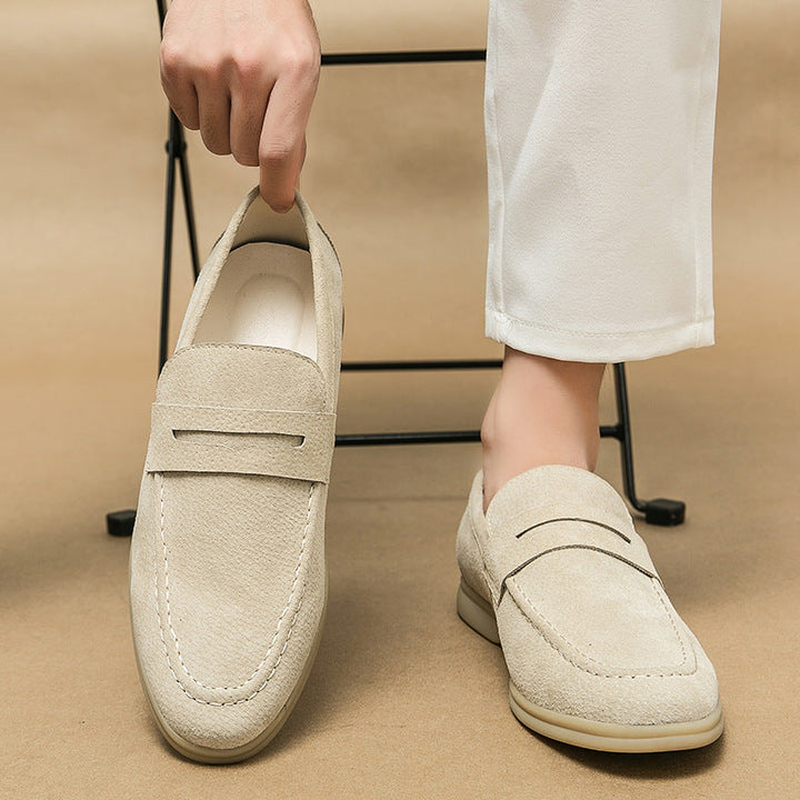 Durable men's vintage slip-on loafers with sturdy outsole. Perfect classic footwear for everyday comfort.