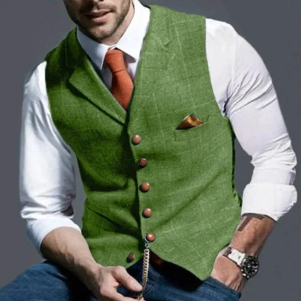 Close-up of a men's vintage vest, showcasing fine fabric texture and button details. Classic style layering piece.