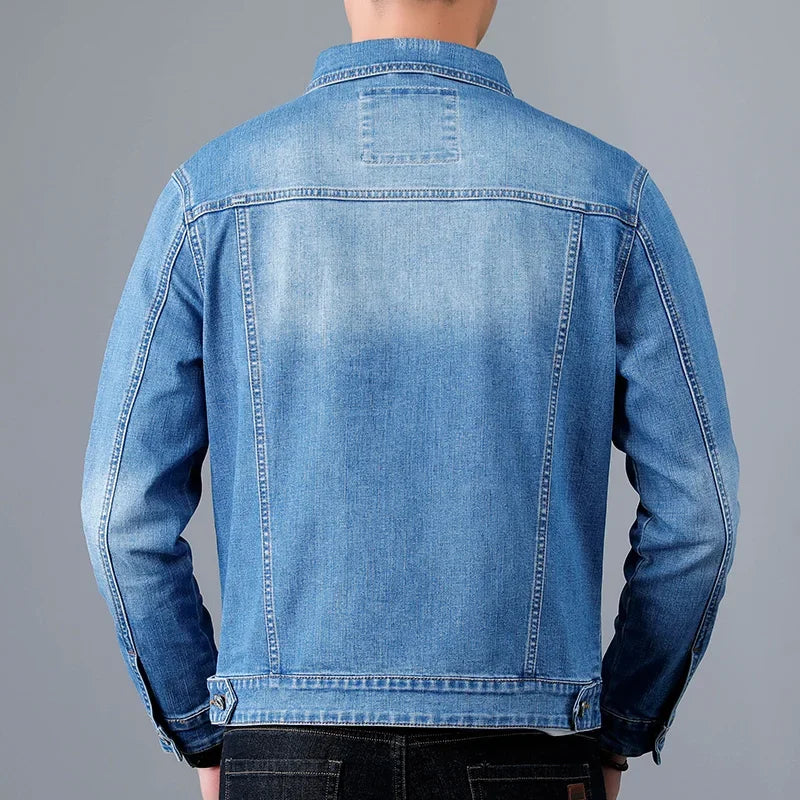 Stylish men's blue denim jacket, vintage distressed design, classic casual outerwear for everyday fashion.