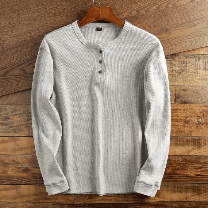 Men's waffle knit henley shirt, long sleeve casual top. Ideal for comfortable everyday wear and style.