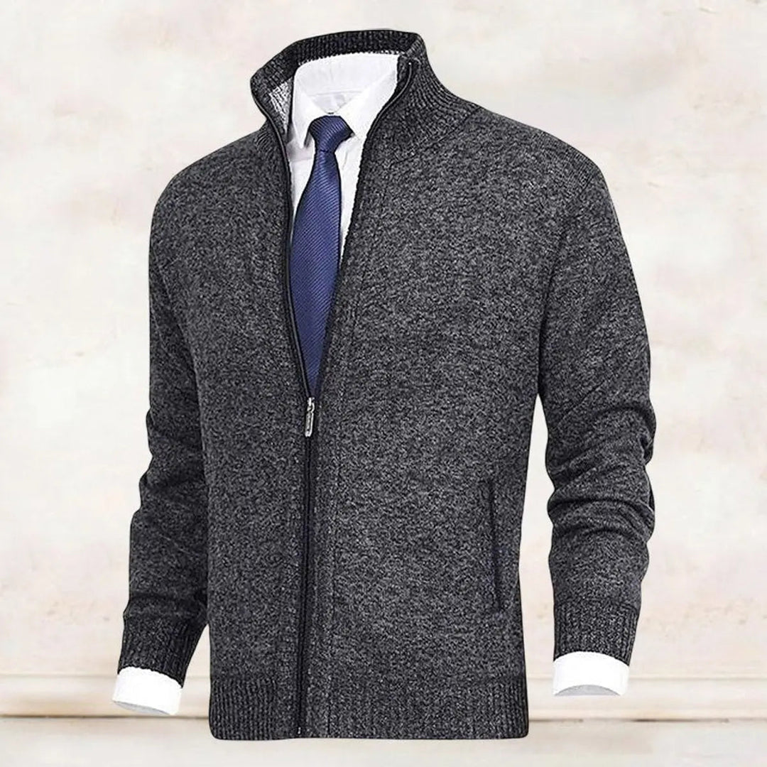 Warm fleece-lined men's zip-up cardigan jumper with stand collar. A smart casual outerwear staple.
