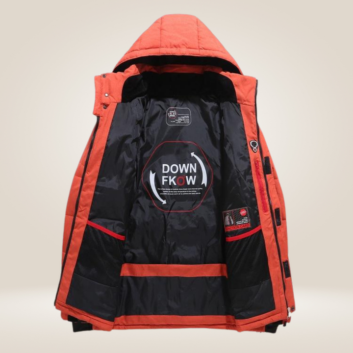Blue men's performance winter parka. Insulated, waterproof jacket for active cold weather use.