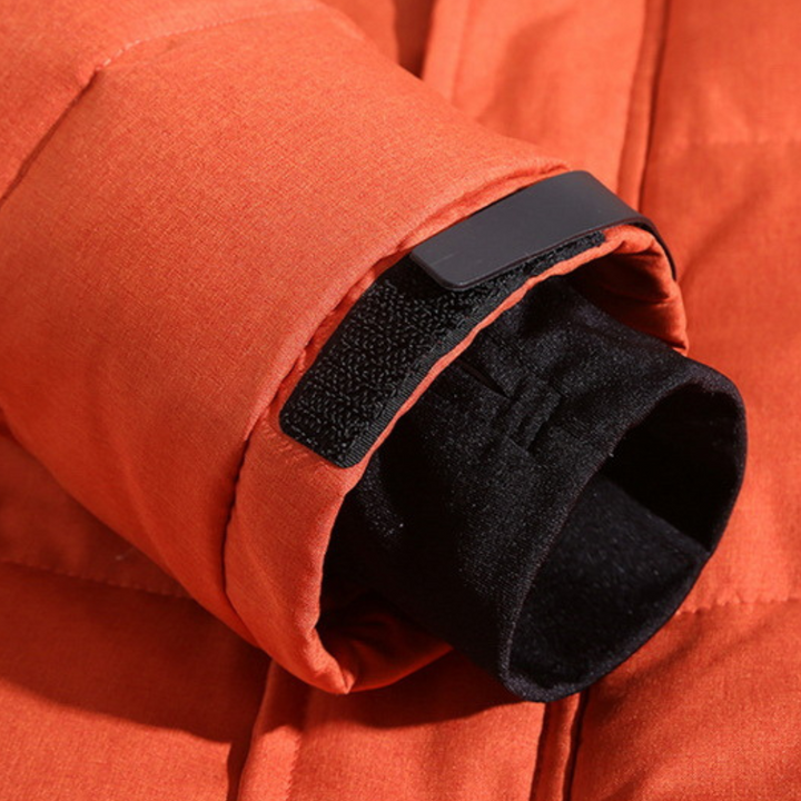 Blue men's insulated winter parka. Warm, waterproof & windproof jacket for outdoor gear.