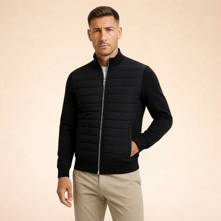 Men's warm quilted hybrid jacket with stretch knit sleeves, perfect for versatile, smart casual seasonal wear.