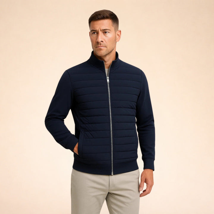 Stylish men's quilted hybrid jacket, featuring a warm design and comfortable stretch sleeves for active wear.