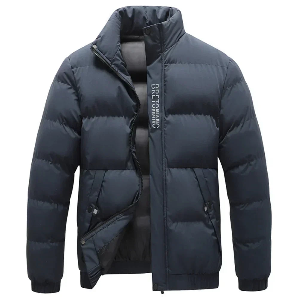 Stylish men's black winter coat. Tactical, waterproof, and wind-resistant outerwear for cold weather and outdoor adventures.
