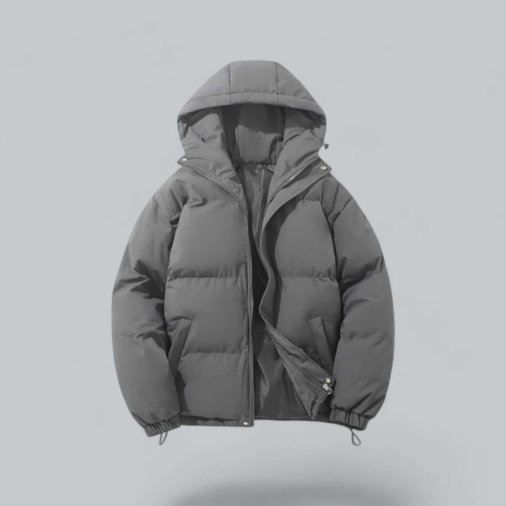 Insulated men's winter parka coat, designed for extreme cold. Features a protective adjustable hood for warmth.