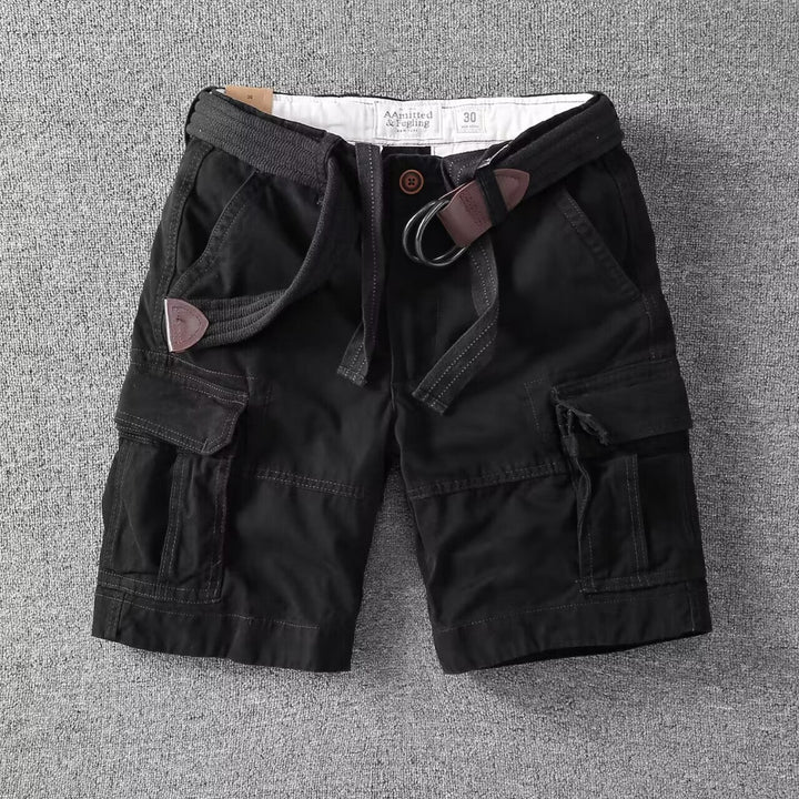 Stylish men's washed cargo shorts, relaxed fit. Features utility pockets for a modern streetwear summer look.