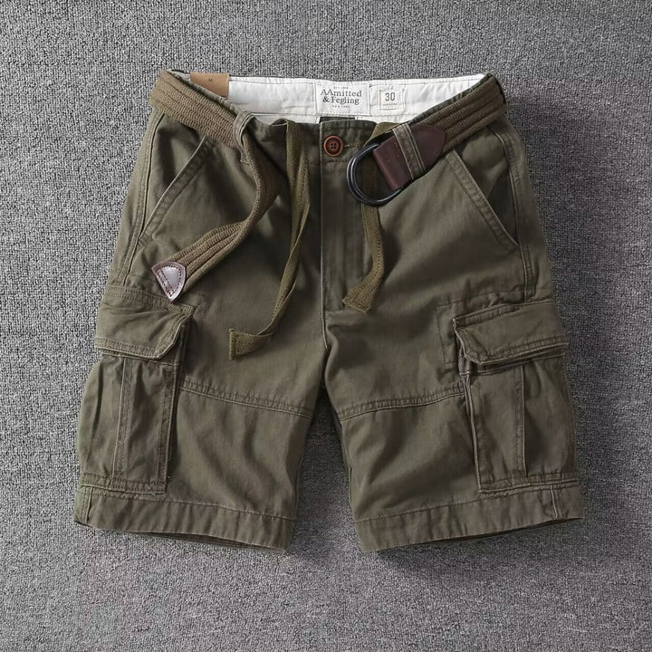 Durable washed finish men's utility cargo shorts. Relaxed fit design for comfortable streetwear & summer essentials.