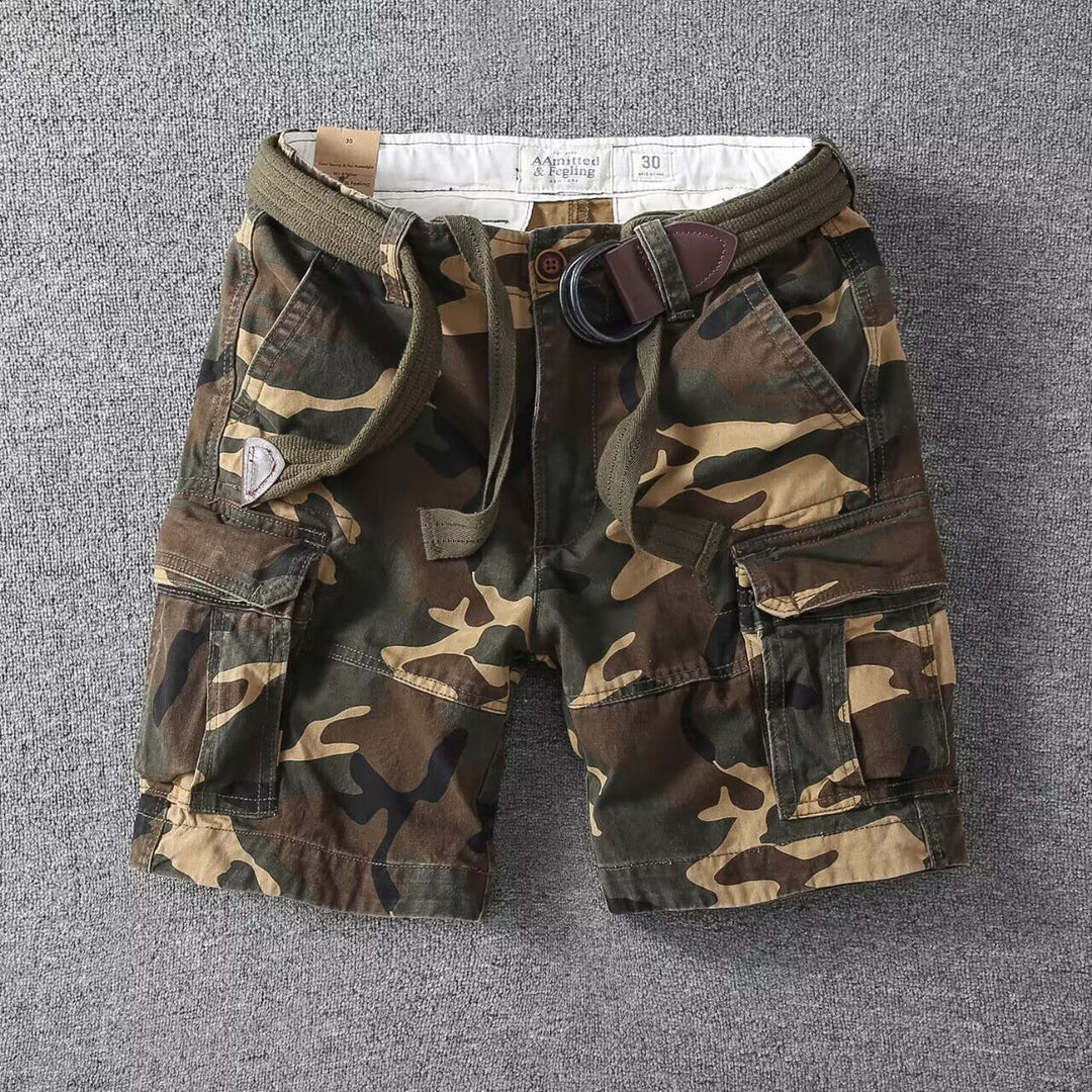 Men's relaxed fit washed cargo shorts. Utility pockets & streetwear style for comfortable summer adventures.