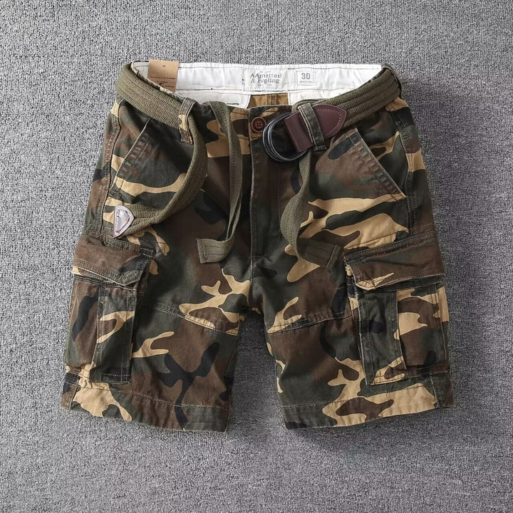 Men's relaxed fit washed cargo shorts. Utility pockets & streetwear style for comfortable summer adventures.