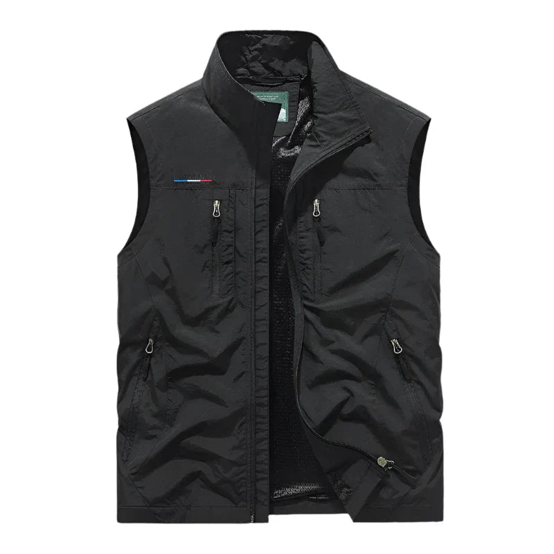 Casual men's sleeveless jacket, a versatile waterproof gilet, perfect for layered outdoor fashion & travel.