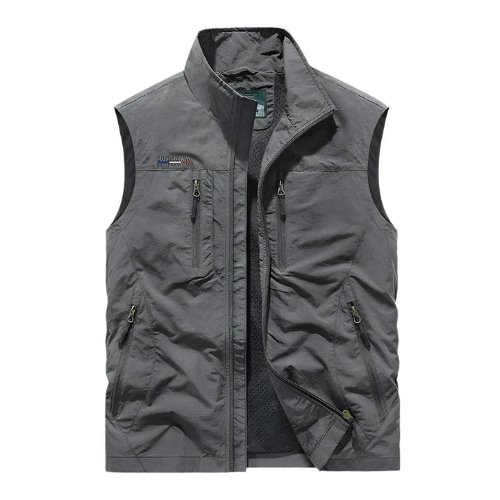 Stylish men's waterproof gilet, a casual sleeveless jacket designed for dry, warm outdoor and everyday layered wear.