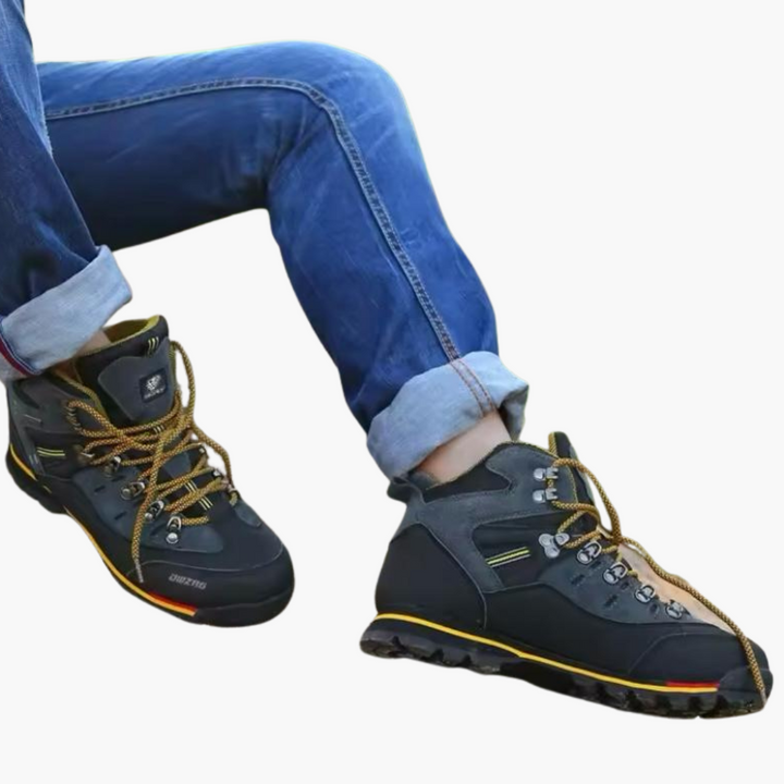 Waterproof men's hiking footwear with robust all-terrain non-slip outsole for secure trekking.