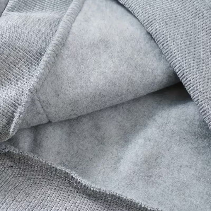 Durable men's waterproof zip hoodie, loose fit and warm for winter wear.