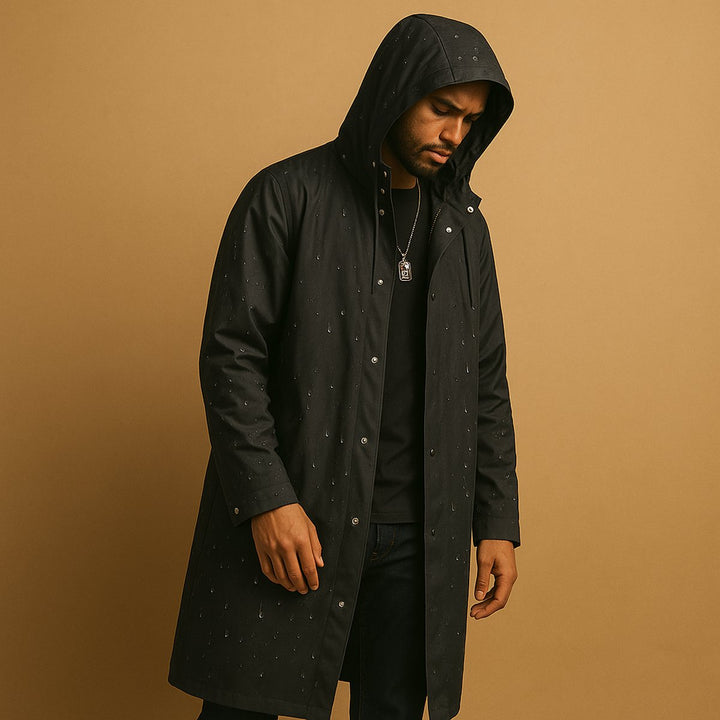 Stylish men's long waterproof hooded raincoat for ultimate protection in wet weather. Perfect for camping & casual wear.