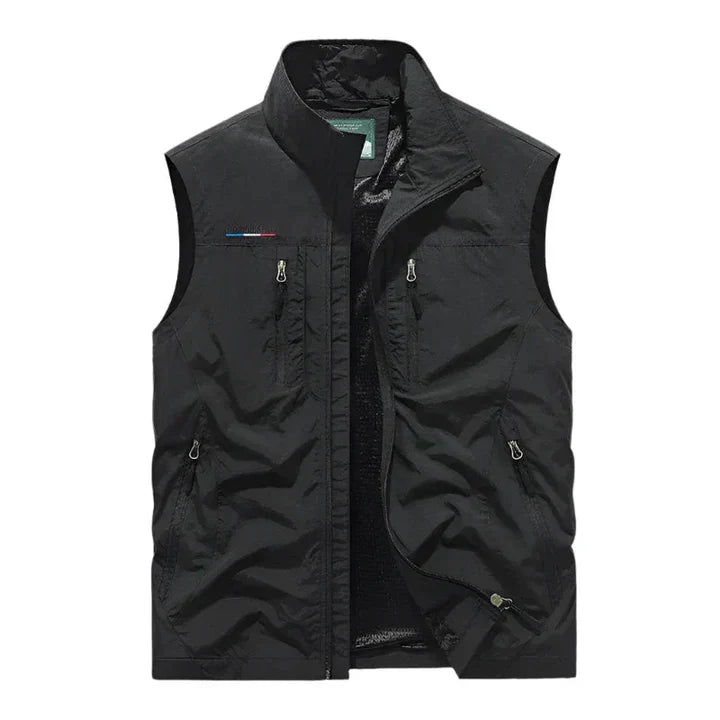 All-season men's insulated vest, weather-resistant and waterproof. Ideal for outdoor adventures and daily wear.