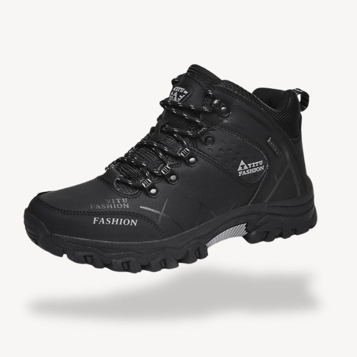 Men's comfort-focused waterproof hiking boots, providing orthopedic support for all your rugged outdoor journeys.