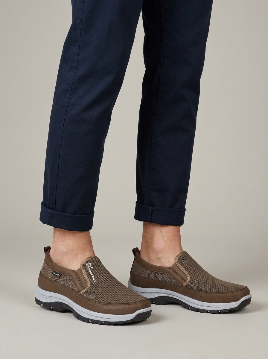 Men's waterproof orthopedic slip-on sneakers with elastic panels, ensuring all-day comfort for casual wear.
