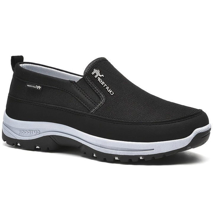 Stylish men's waterproof slip-on sneakers with orthopedic comfort, elastic panels, and durable all-season design.