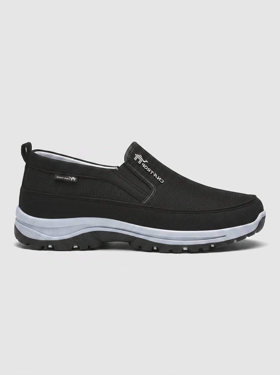 Comfortable men's waterproof slip-on orthopedic shoes with elastic panels, ideal for all-season casual wear.