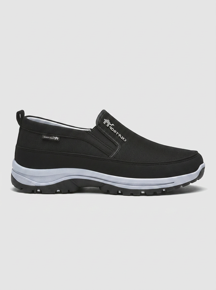 Comfortable men's waterproof slip-on orthopedic shoes with elastic panels, ideal for all-season casual wear.