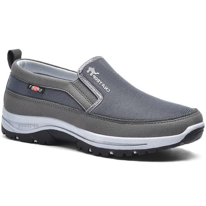 Detailed view of elastic side panels on men's waterproof orthopedic slip-on comfort sneakers for easy fit.