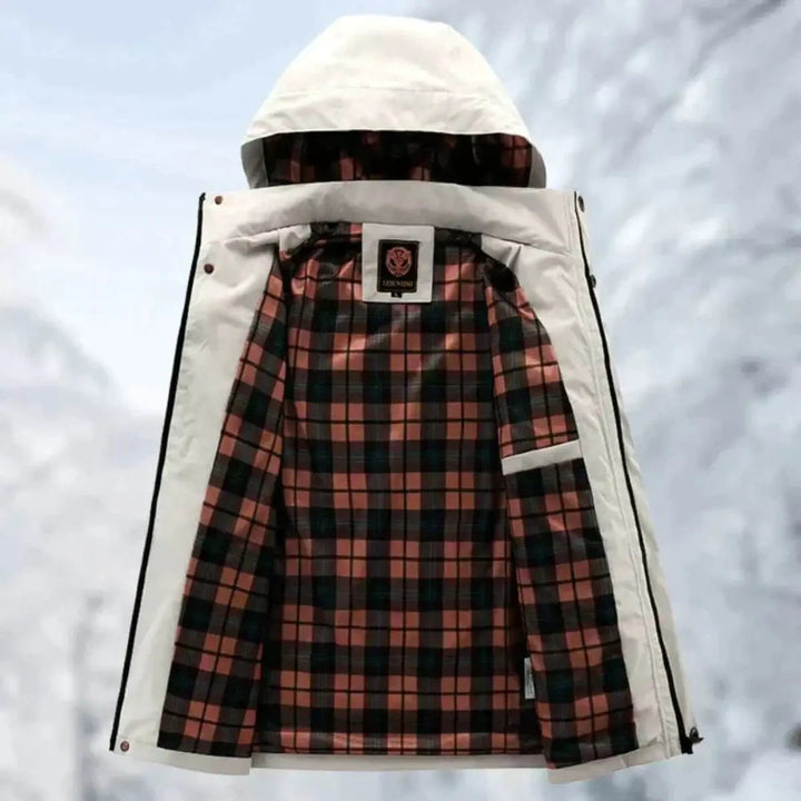 Durable men's waterproof hiking jacket, quilted & hooded for all-weather outdoor protection.