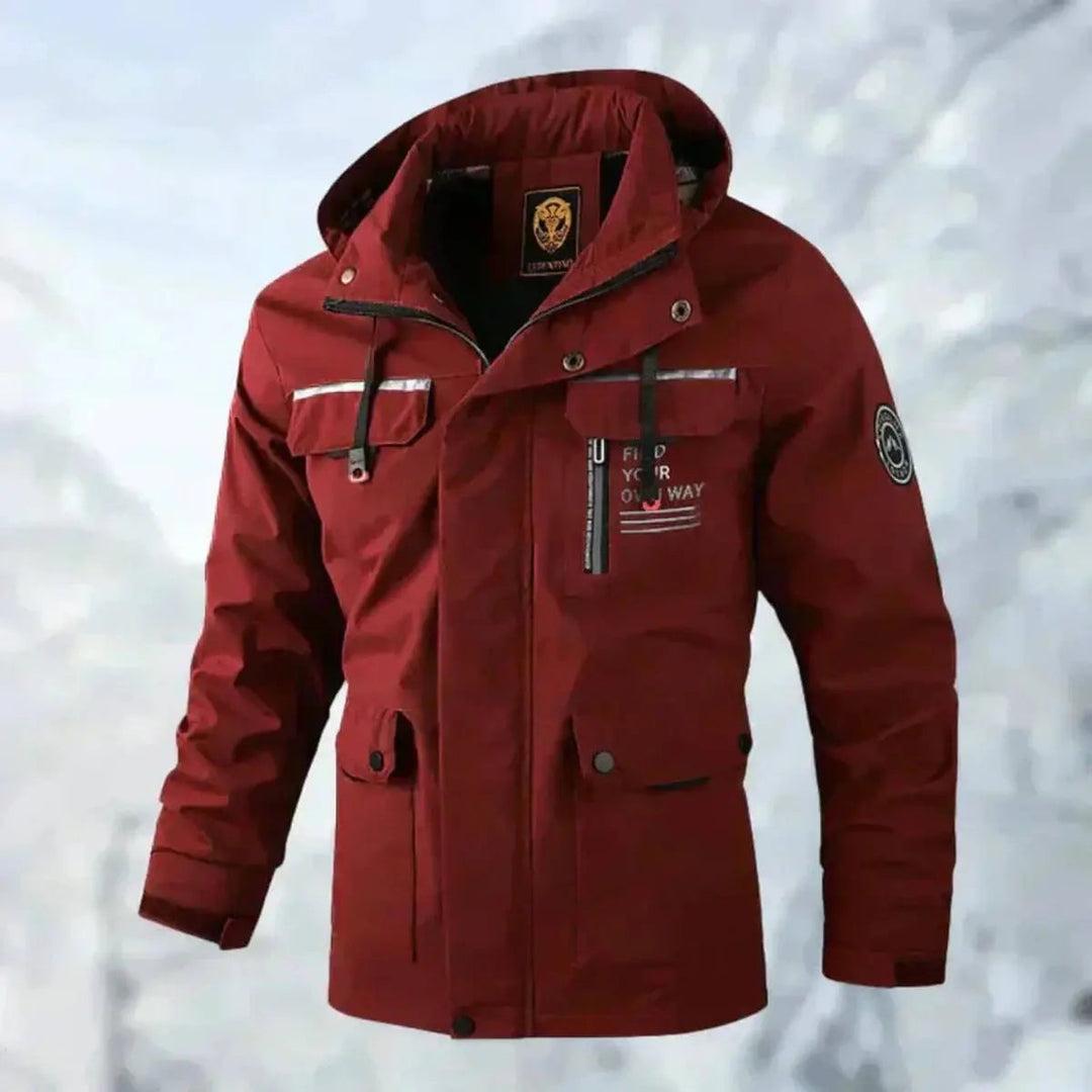 Quilted men's outdoor jacket, hooded, waterproof & windproof for cold weather comfort.