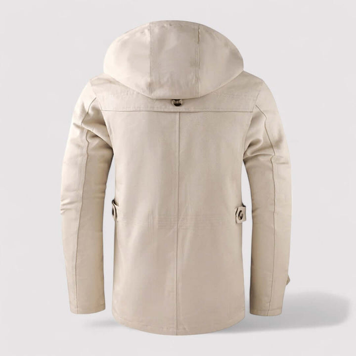 High-performance men's waterproof winter jacket, insulated & hooded for cold weather outdoor activities.