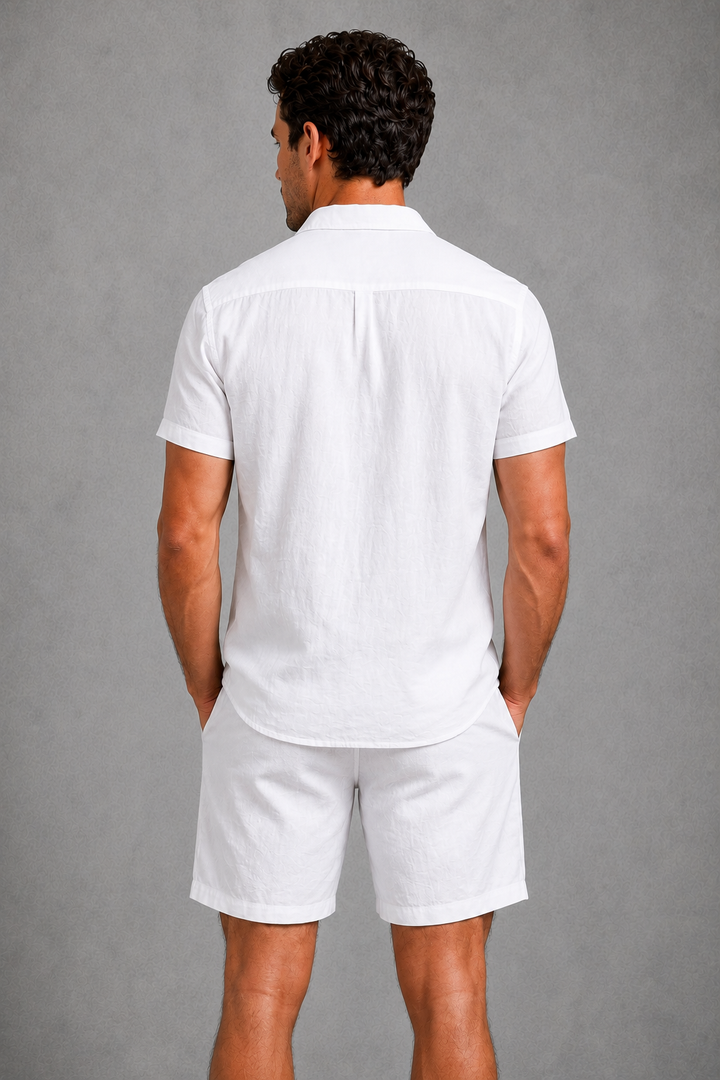 Men's tailored linen blend co-ord set in white for summer. Versatile casual wear, great for beach or resort fashion.
