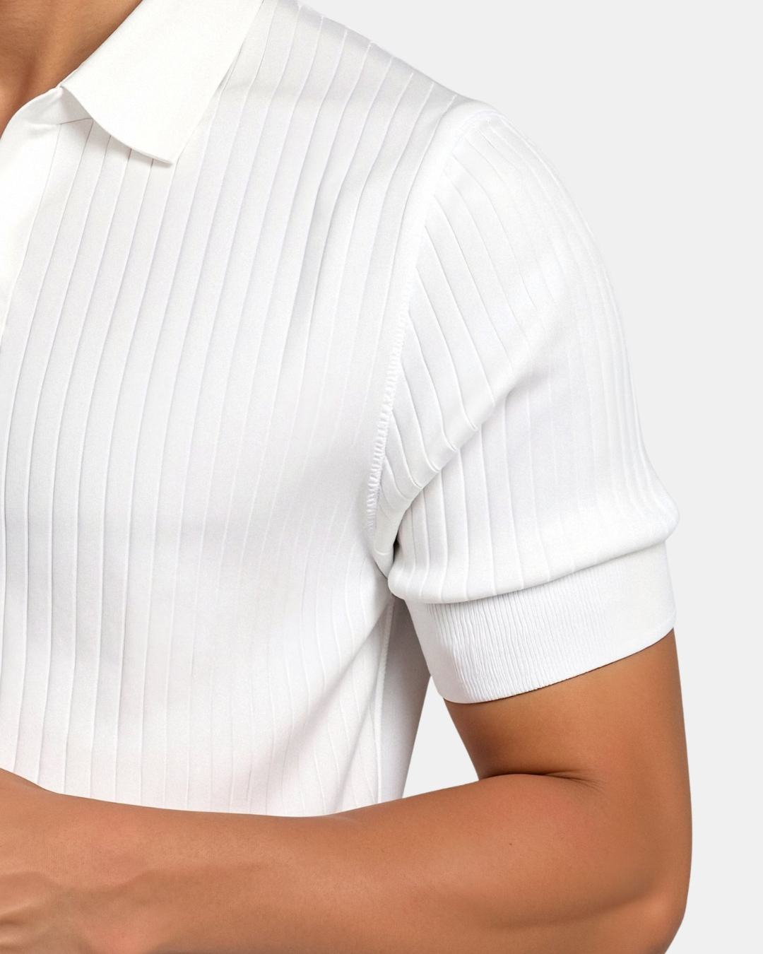 Comfortable men's white ribbed knit short sleeve polo, a stylish addition to any spring wardrobe.
