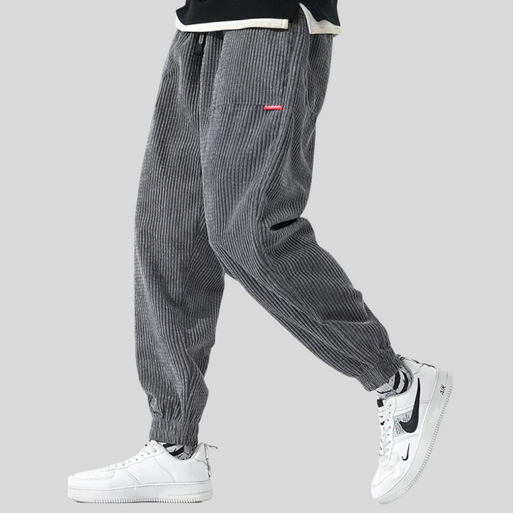 Men's wide corduroy joggers in relaxed fit, ideal for everyday comfort & casual wear. Soft textured pants.