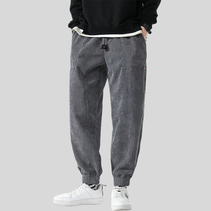 Relaxed fit men's wide corduroy joggers. Comfortable wide-leg pants for casual fashion & everyday loungewear.