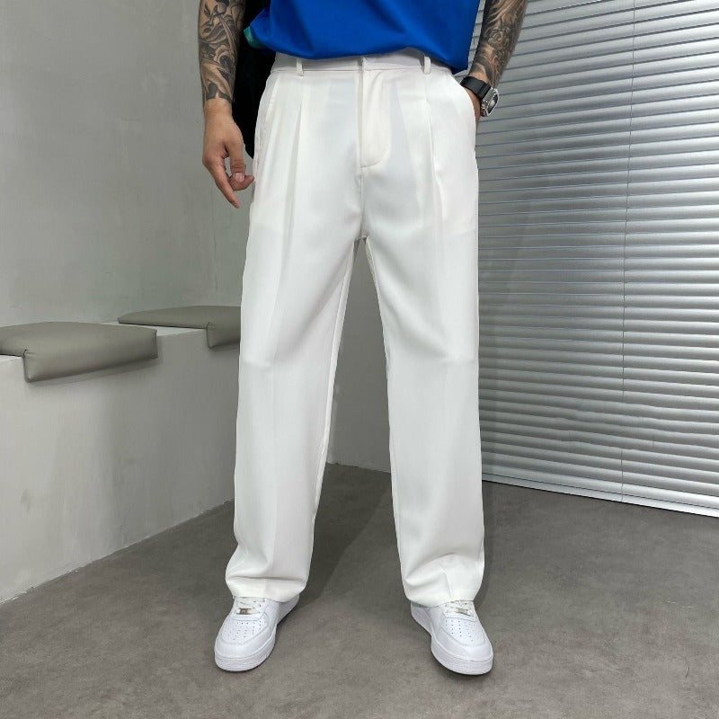 Relaxed fit men's wide-leg dress trousers, double-pleated for comfort & style. Ideal for formal, workwear, or smart casual fashion.