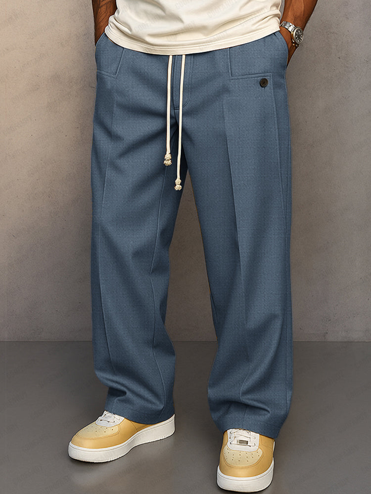 Stylish men's wide leg pleated trousers featuring an adjustable drawstring waist for a custom fit.