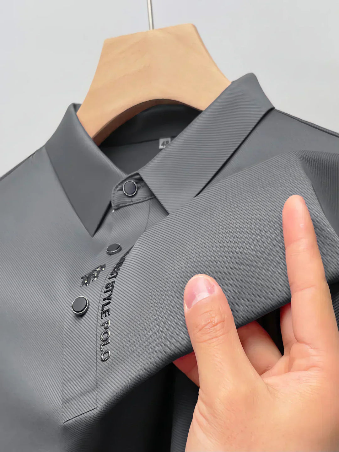 Effortlessly stylish men's wrinkle-free polo, durable and breathable for everyday spring/summer wear.