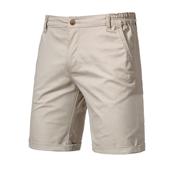 Relaxed fit men's chino shorts, perfect for smart casual summer outfits. Comfortable & stylish warm-weather wear.
