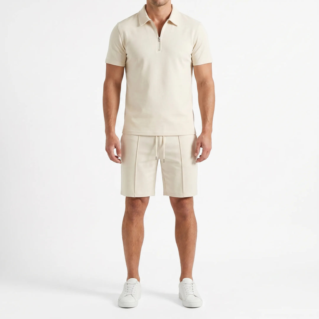 Stylish men's summer outfit: a comfortable zip polo shirt paired with matching casual shorts.