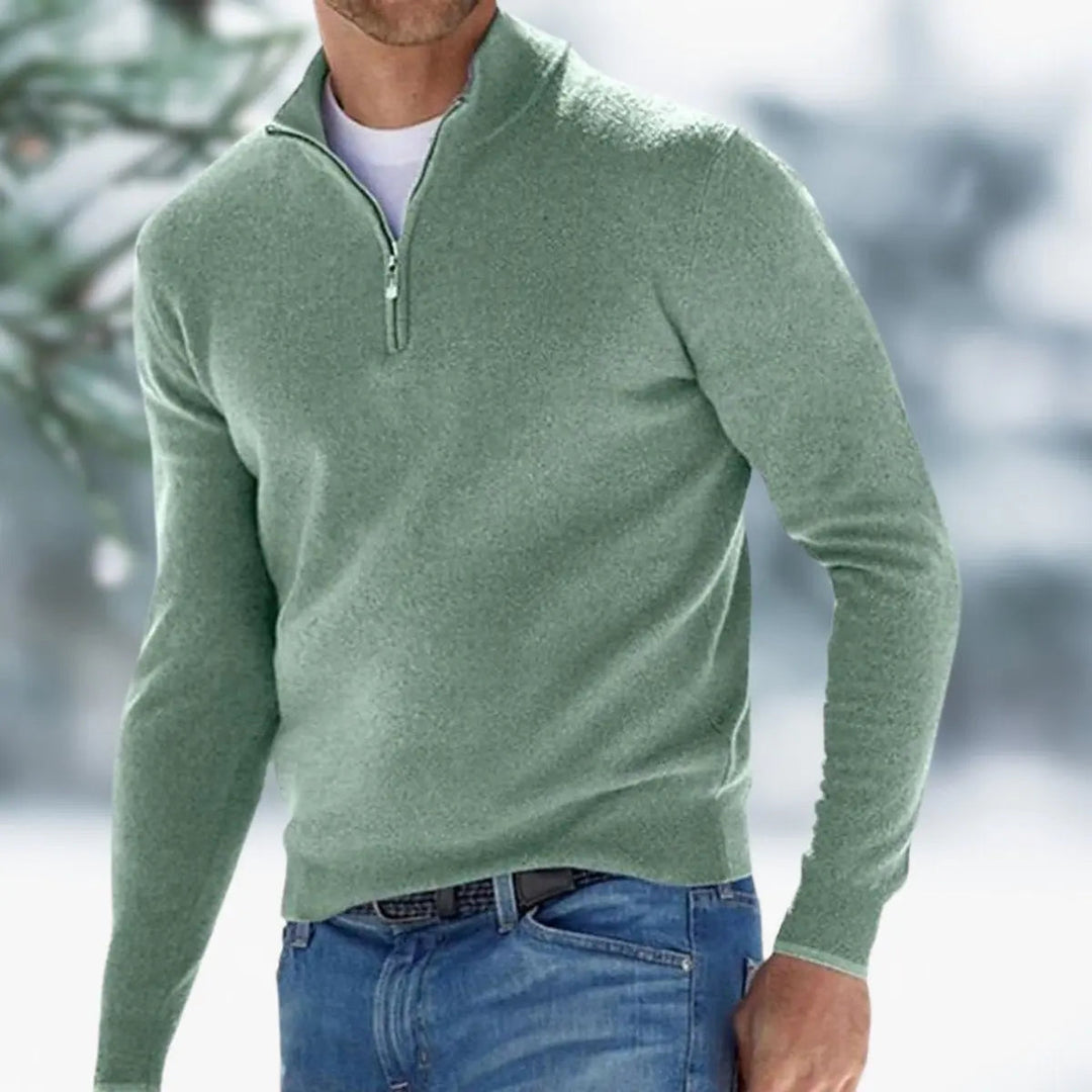 A man wearing a stylish quarter-zip knit pullover, showcasing its smart casual fit and design.