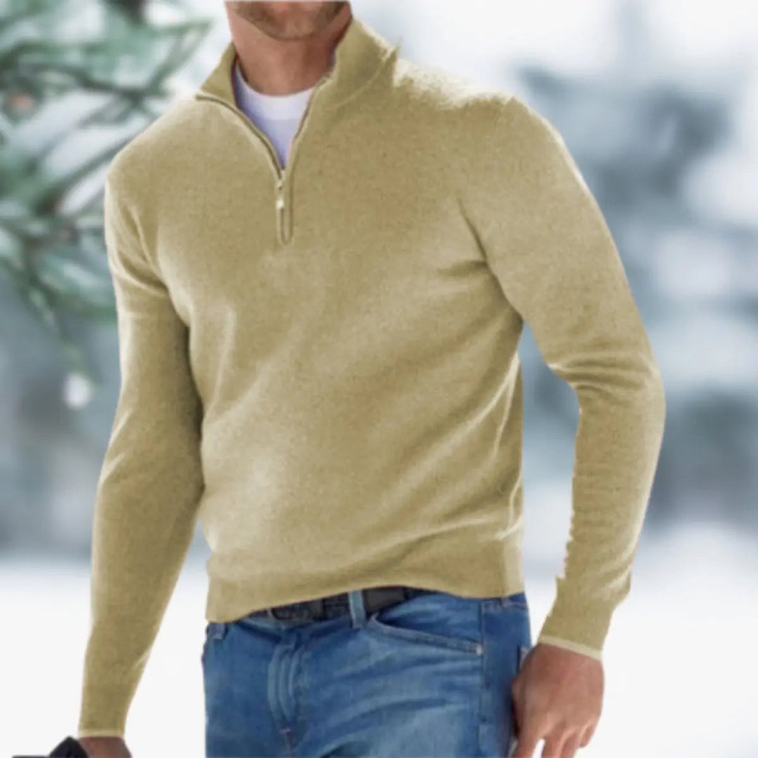 Detail of the quarter-zip collar on a men's versatile knit sweater, highlighting quality and style.