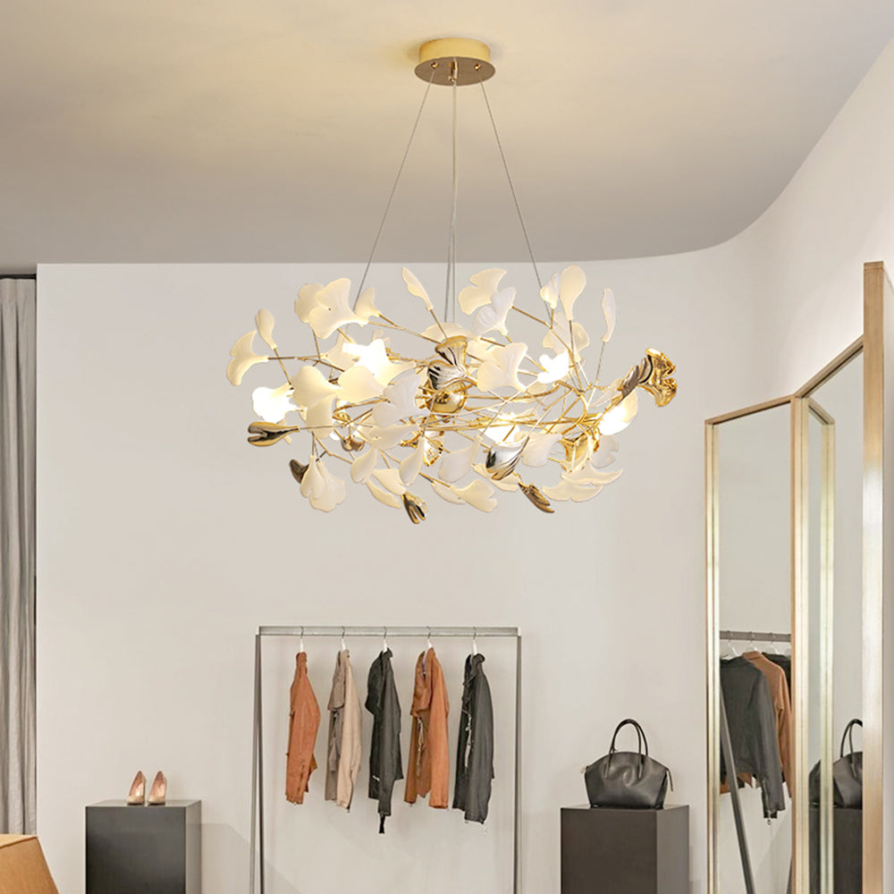 Elegant Merrlian sculptural LED pendant light, gold & white for modern home decor.