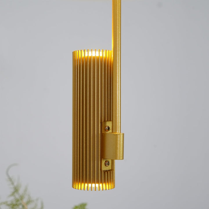 Merru disc LED chandelier brightening a modern entryway.