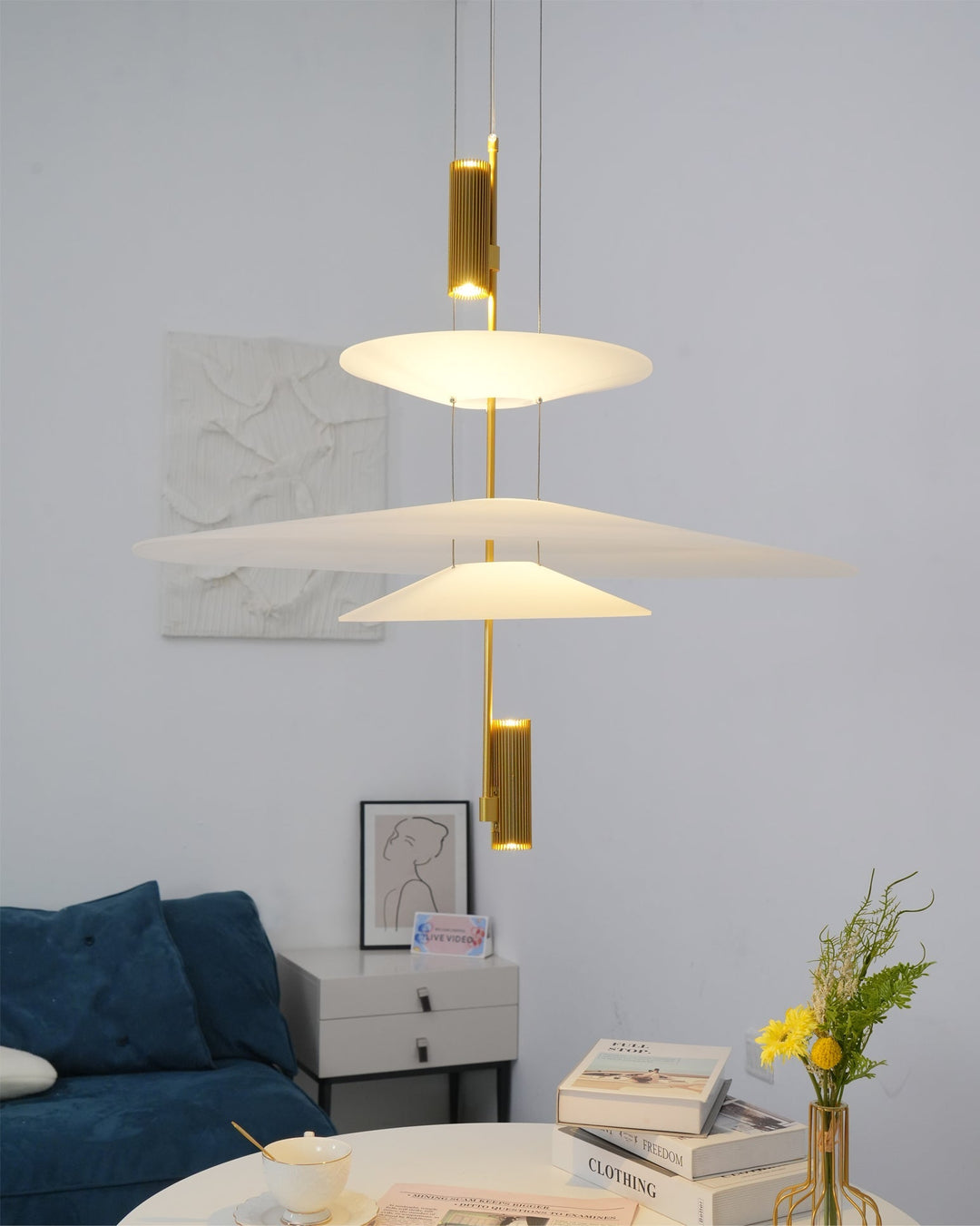 Slim profile Merru LED disc pendant light, minimalist modern design.