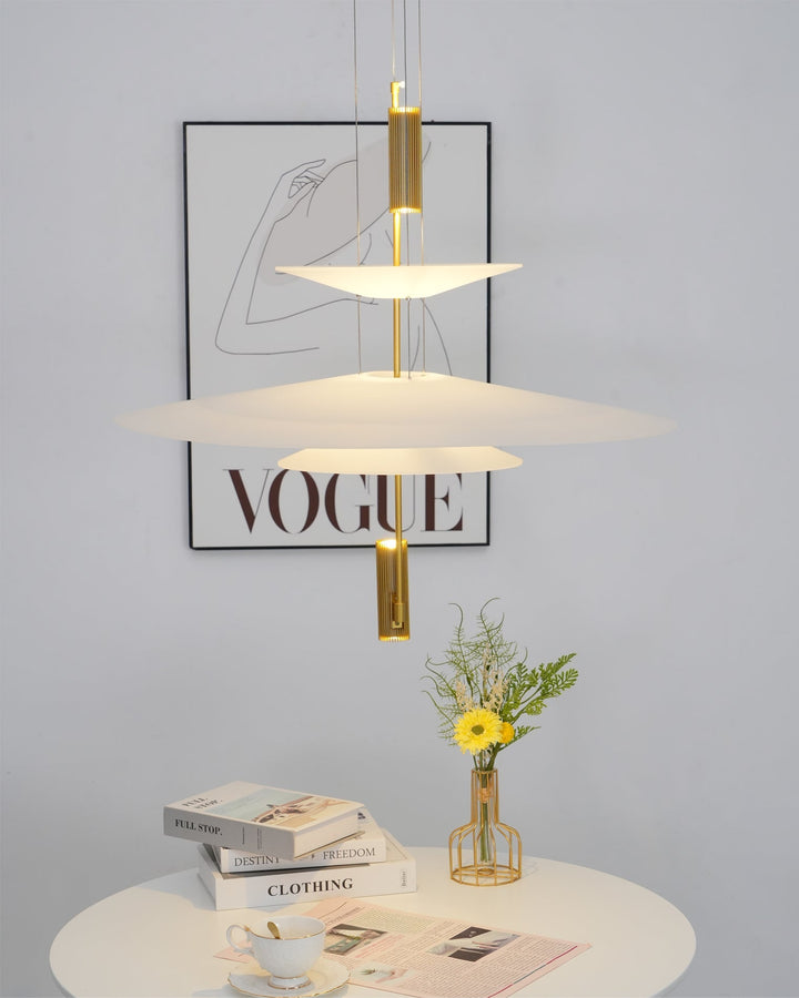 Dimmable Merru LED sculptural disc pendant, creating versatile lighting.