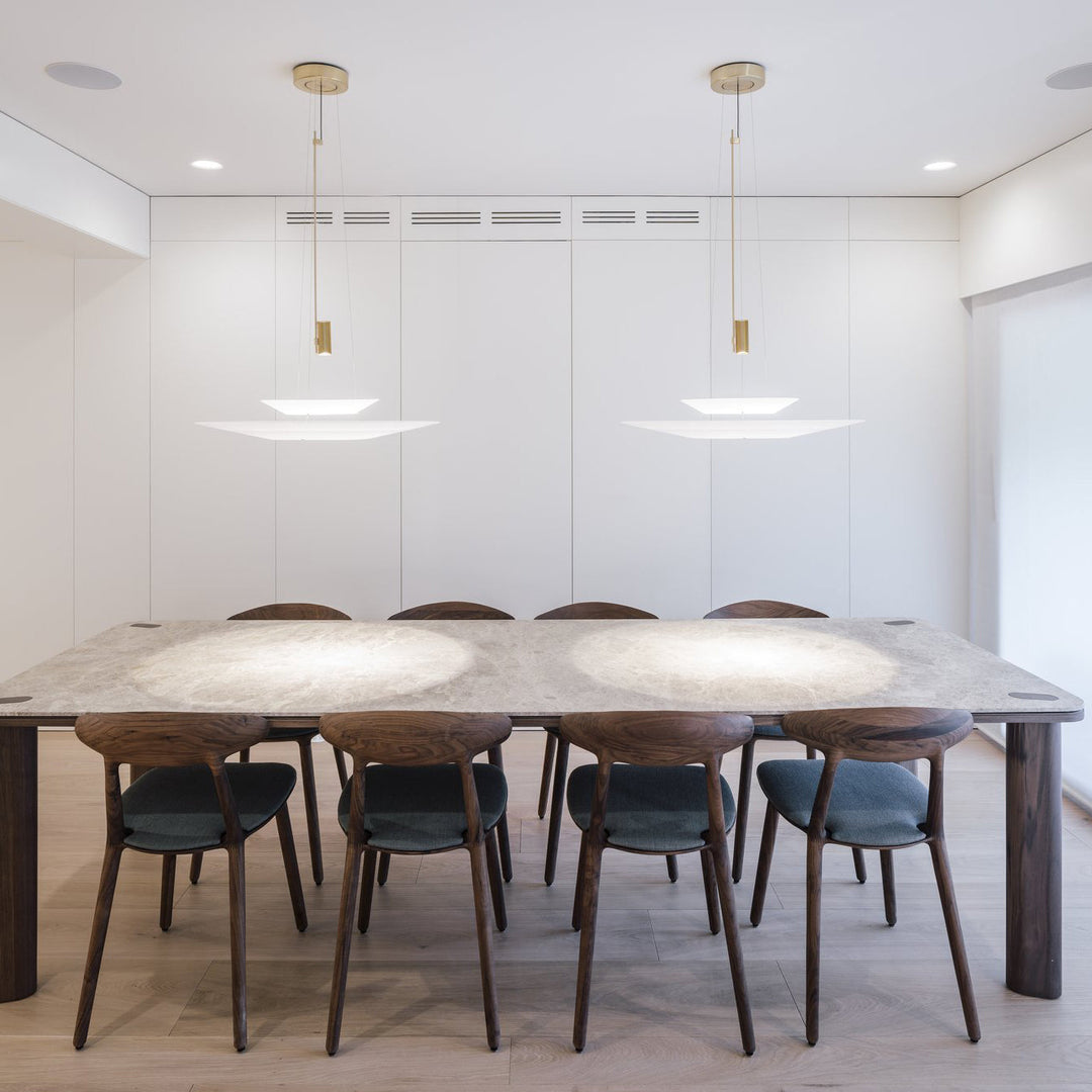 Elegant Merru LED pendant light, disc design, ideal for modern kitchen islands.