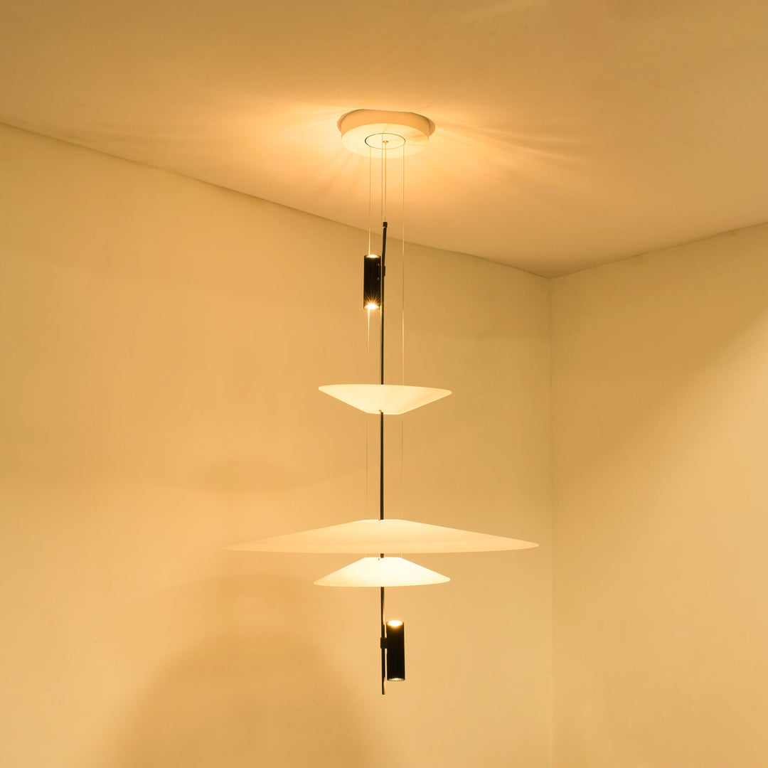 Merru black sculptural disc LED pendant, perfect for contemporary kitchen islands.