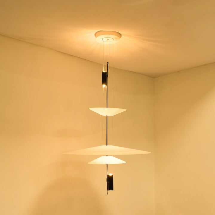 Merru black sculptural disc LED pendant, perfect for contemporary kitchen islands.